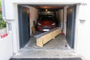 Pose d'un batardeau dans un garage